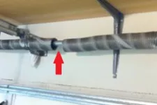 Repairing a Broken Garage Door Spring Is a Dangerous Job!
